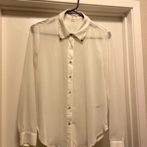 White blouse with gold on collar